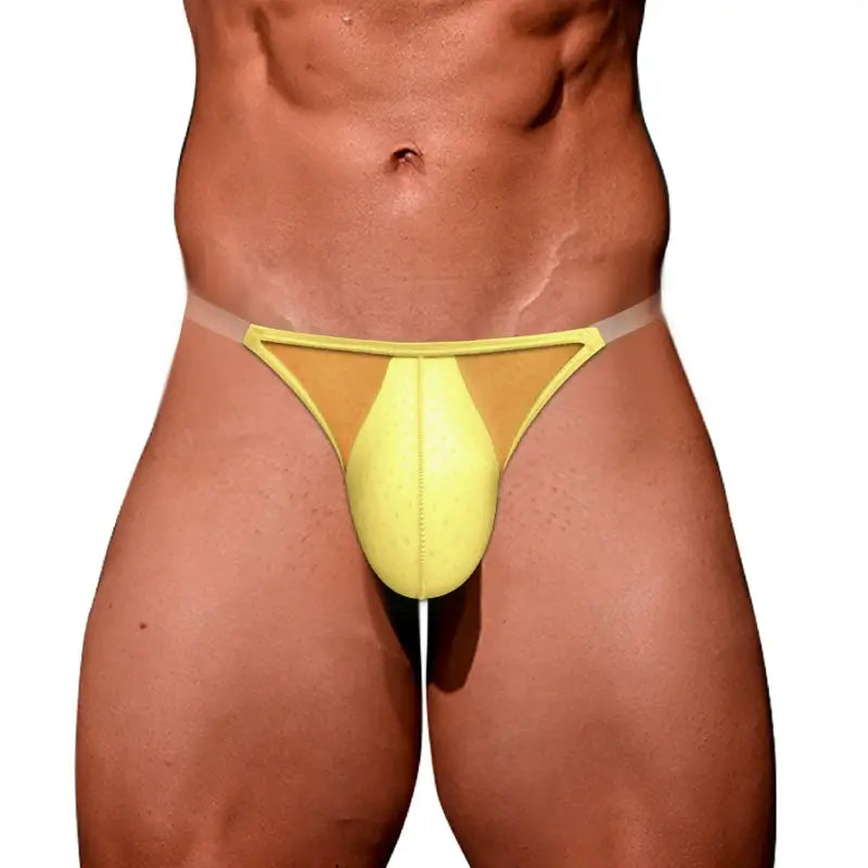 Yellow sheer mens thong worn on male model, front view - Adannu AD319
