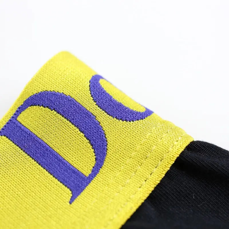 Black modal long johns waistband — gold elastic blue logo	