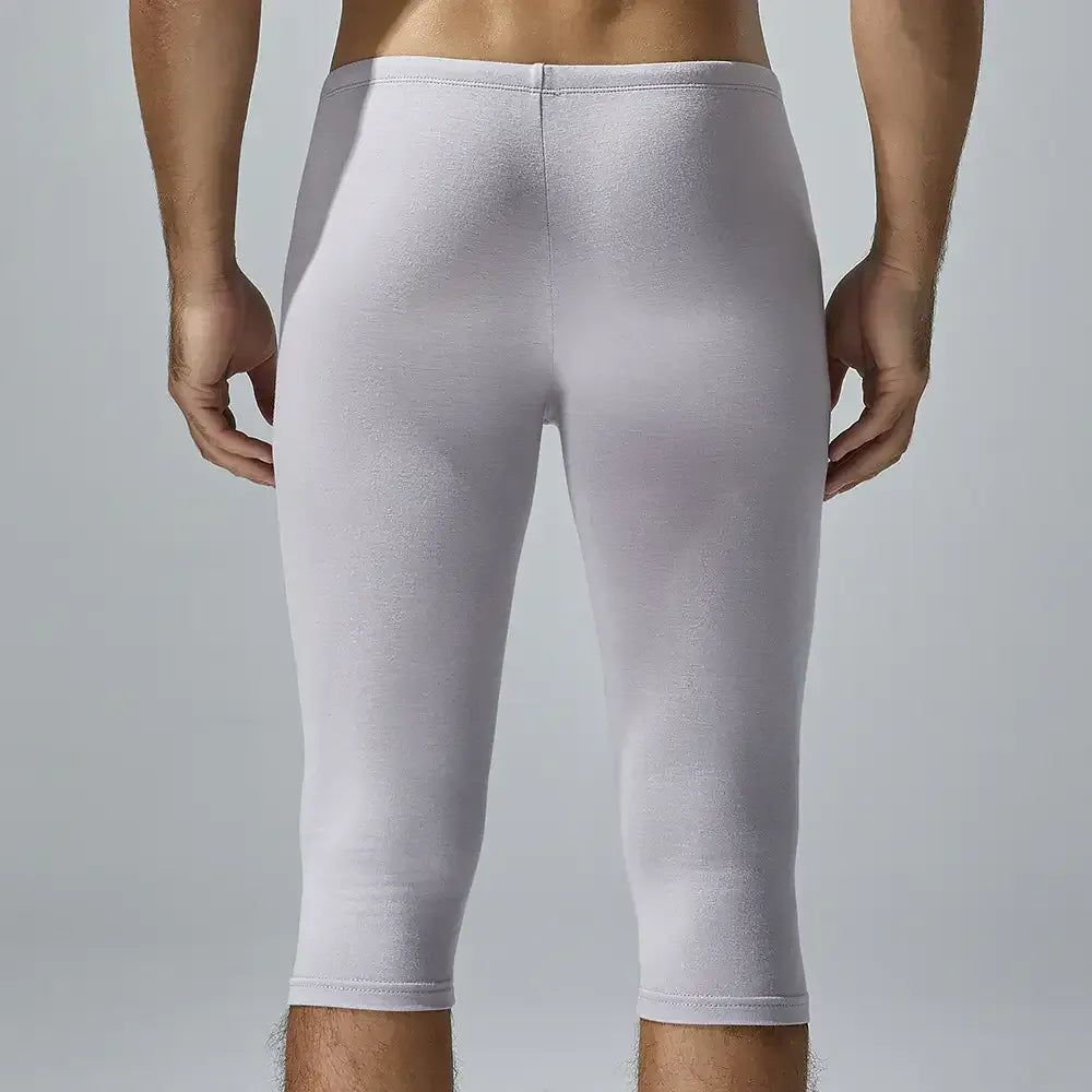TAUWELL Tauwell Men's Solid Color Low-Rise Fitness Tight Over-the-Knee Shorts
