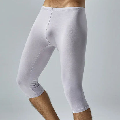 TAUWELL Tauwell Men's Solid Color Low-Rise Fitness Tight Over-the-Knee Shorts