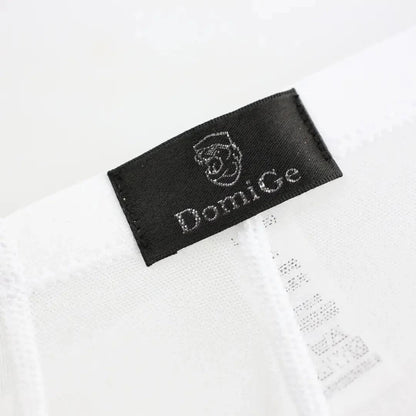 White sheer boxer shorts waistband — DomiGe logo detail	